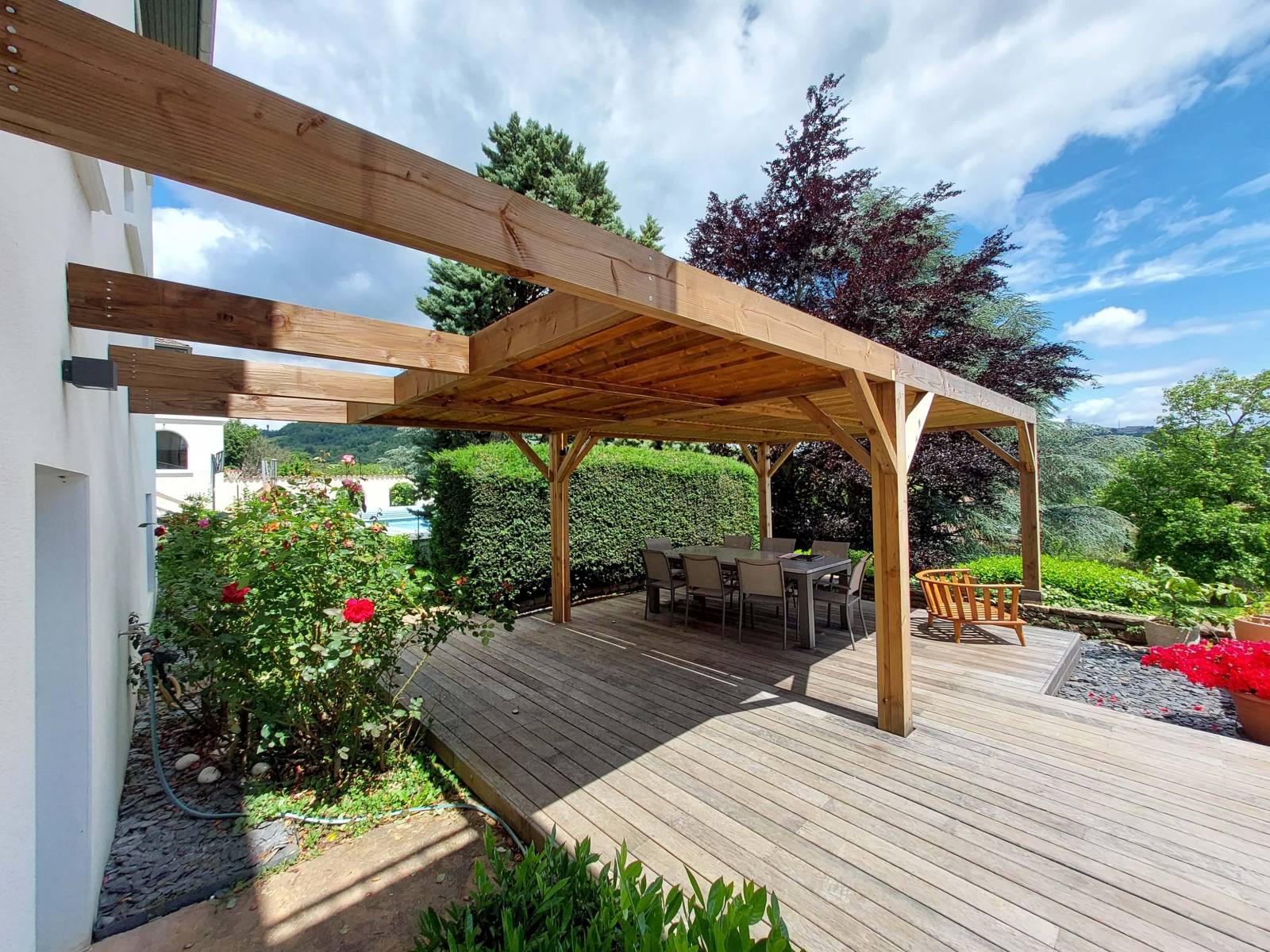 Conception pergola sur mesure avec toile rétractable pour cuisine d'été Craponne 69 Rhône